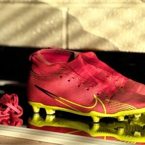 Pink and Yellow Nike Soccer Cleats